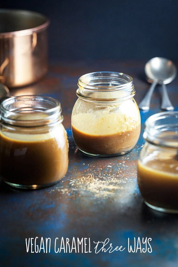 3 jars of different vegan caramels on a dark surface