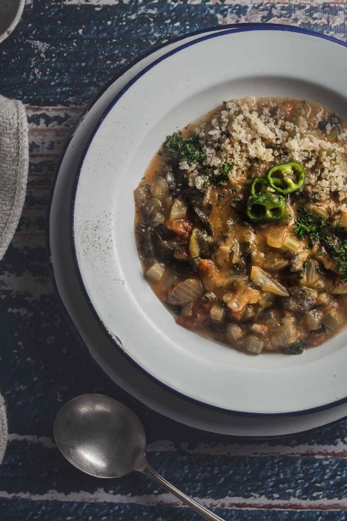 A pot of stew with a ladle