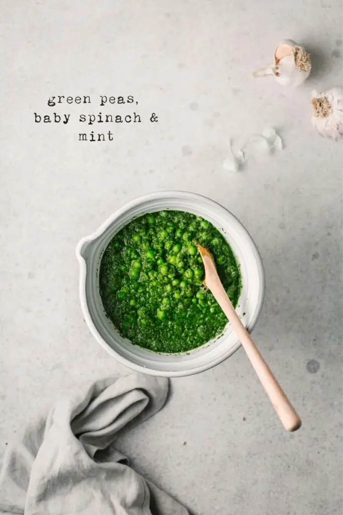 Overhead process image of the green pea, spinach and mint mixture blended to show the correct texture. 