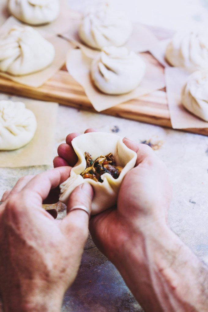 A man making a bao bun