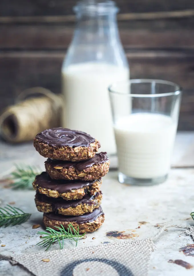 These vegan oatmeal date and pecan cookies are deliciously balanced with sweet pieces of soft caramel dates, nutty ground pecans and toasted oats finished with bittersweet dark chocolate.