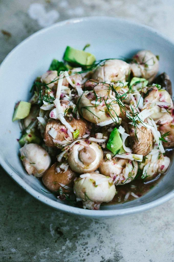 A bowl of mushroom salad