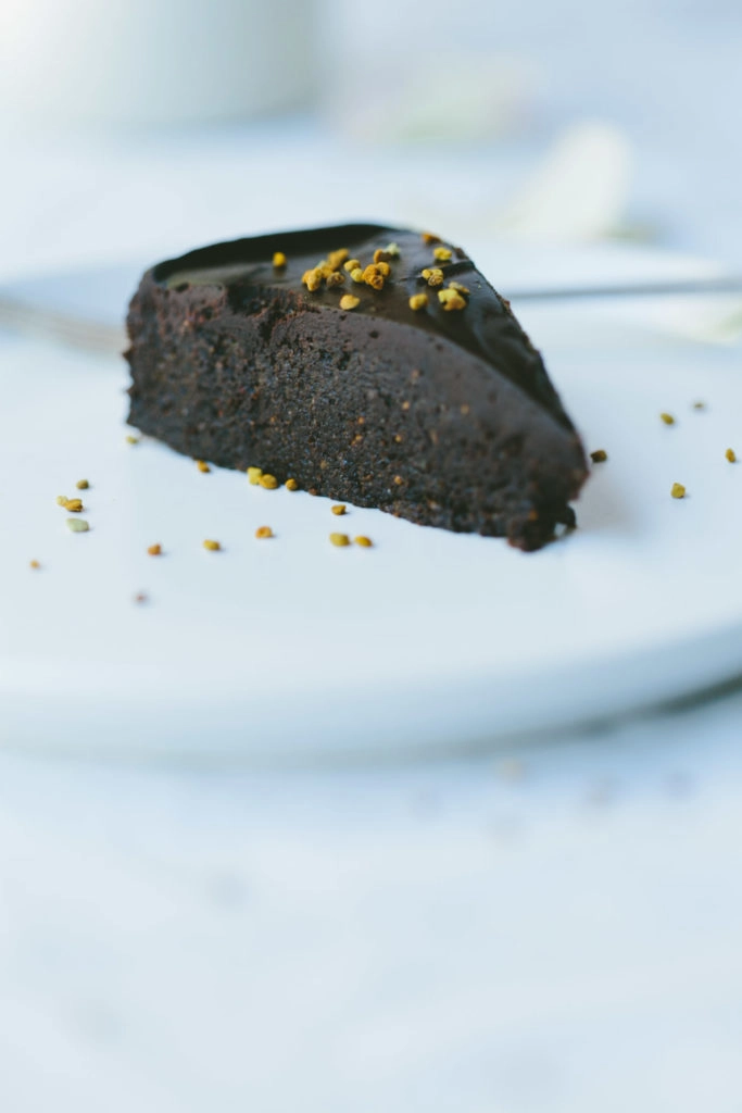 This Loved Up Raw Chocolate Cake is a revelation. Gluten-free, sugar free, dairy-free, nut-free and vegan, this dessert is perfectly rich and gooey. 