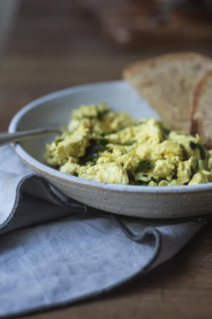 With pan fried tofu, garlic and peppers tossed in a creamy, cheesy vegan sauce this Inspired Scrambled Tofu is the perfect partner to a rainy Sunday morning