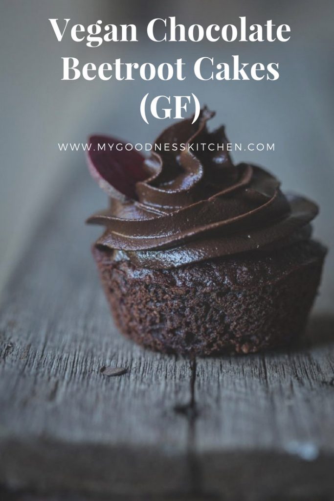 A vegan chocolate cupcake with frosting