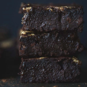A front on image of a stack of brownies.