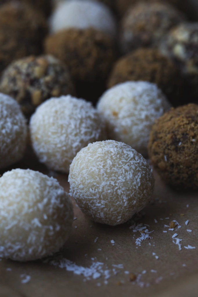 close up image of vegan white chocolate coconut truffle