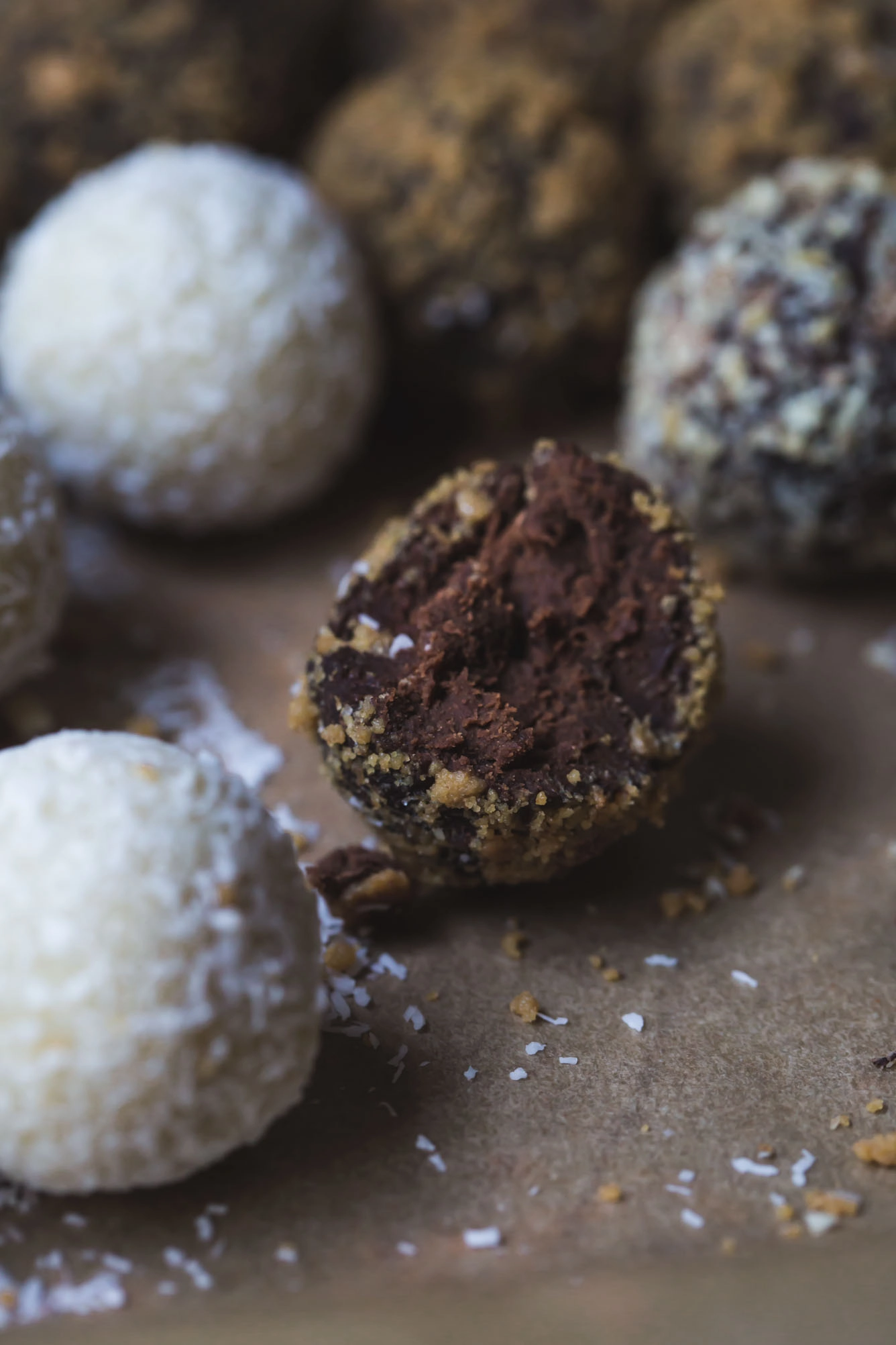 close up image of speculaa crusted chocolate truffle with a bite taken