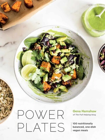 The cover of a cookbook with bowls of salad.