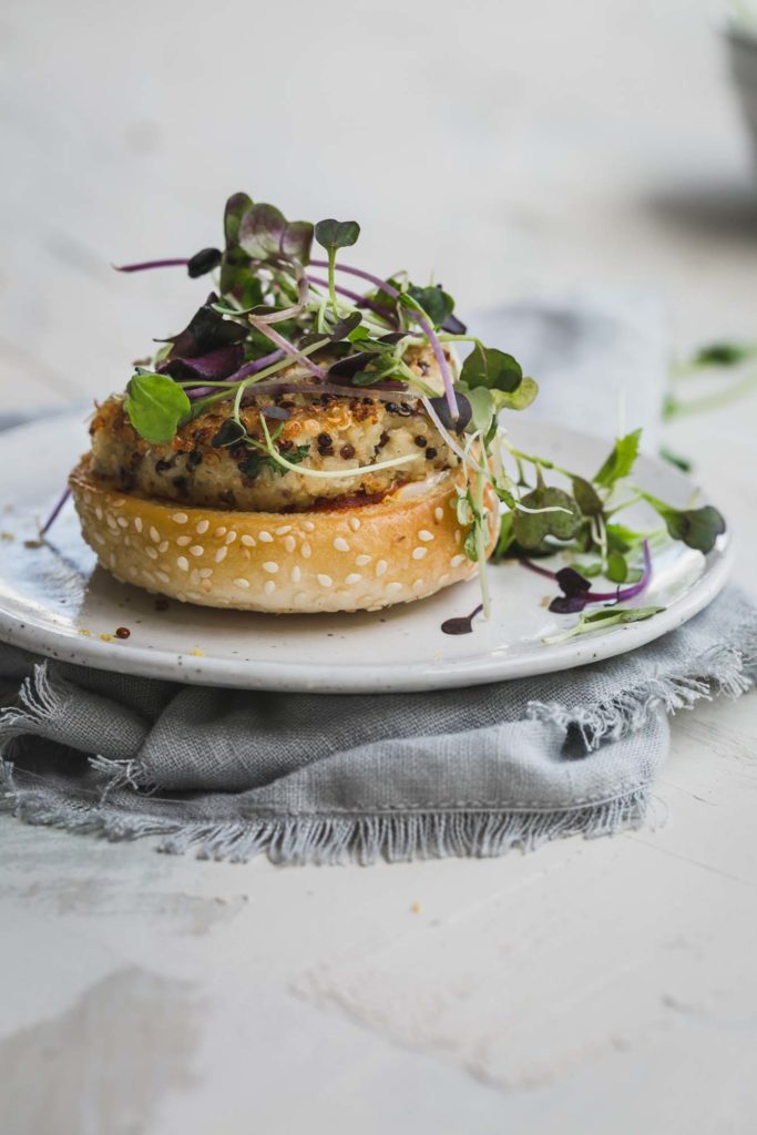 A vegan crispy quinoa cauliflower burger close up