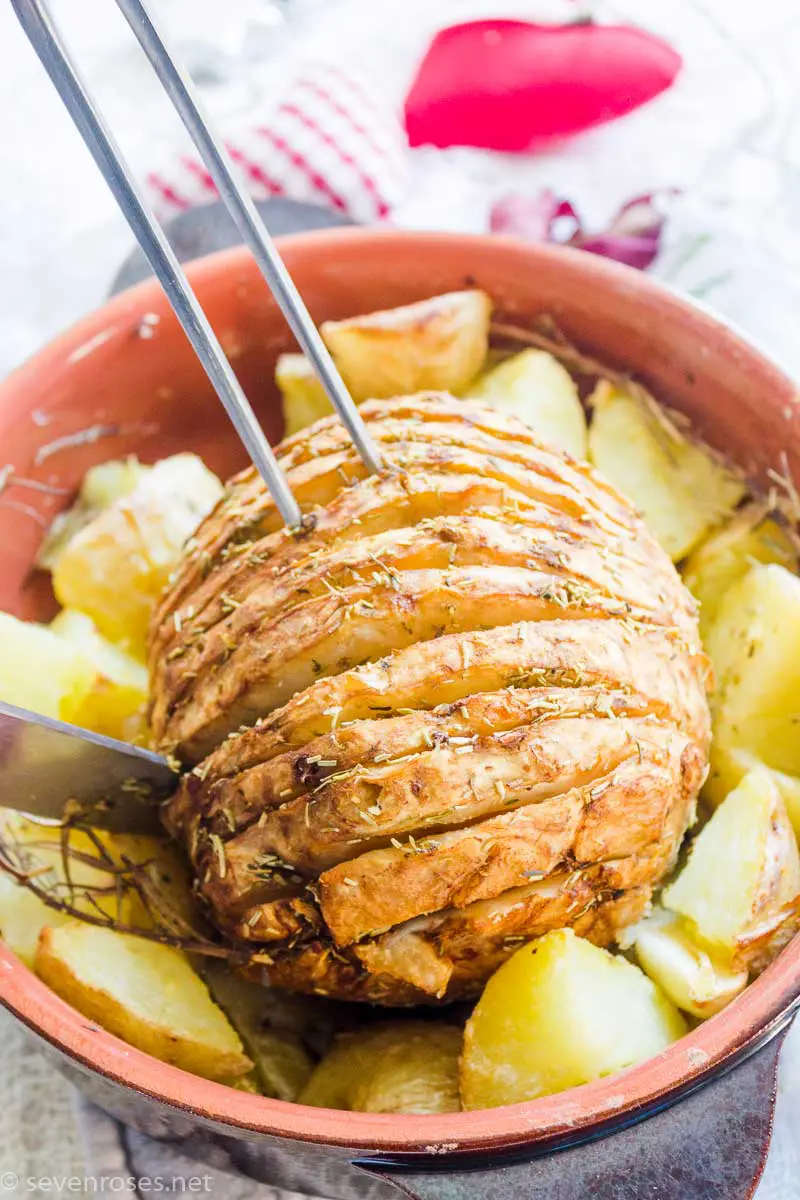 A vegan holiday roast sitting in a baking tray