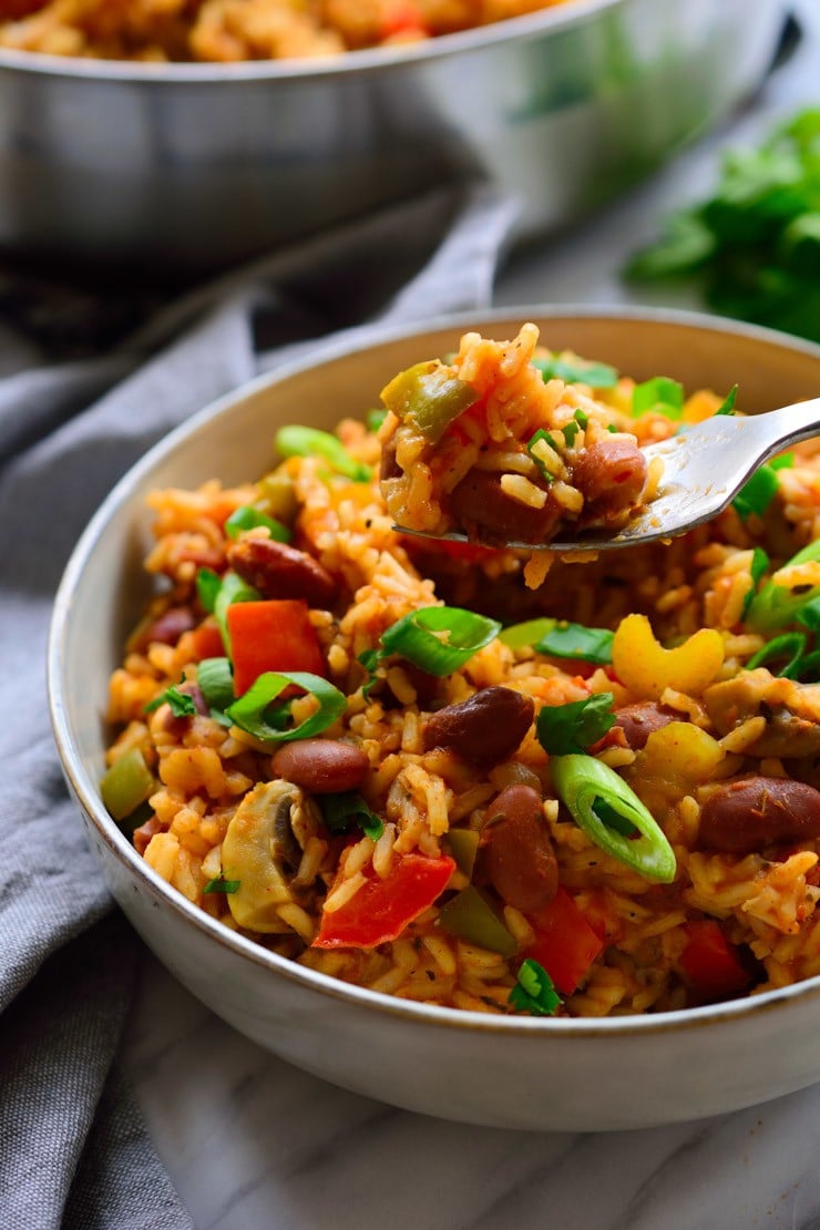 A white bowl full of vegan jambalaya 