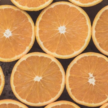 Oranges cut in half in a pattern