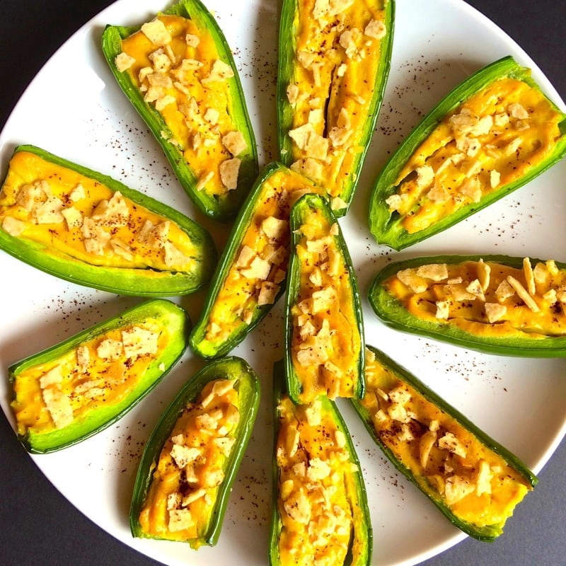 Stuffed peppers on a white plate. 