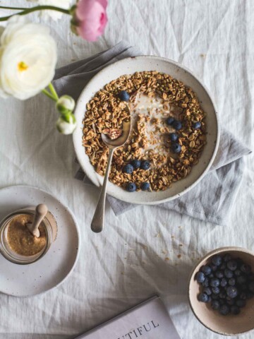 Inspired by Purely Elizabeth's granola, this homemade almond butter maple granola is deliciously moreish being a little salty and a little sweet.