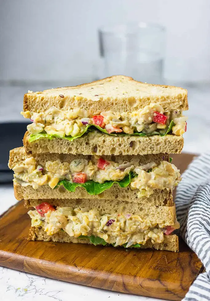 A stack of chickpea sandwiches. 