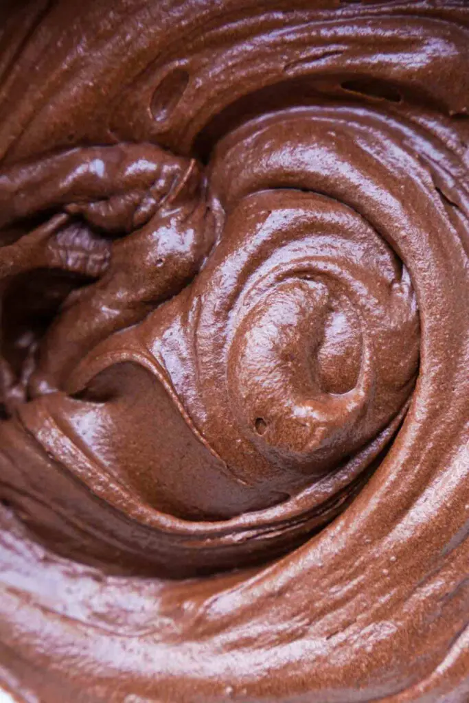 close-up, full frame image of a vegan chocolate frosting swirl