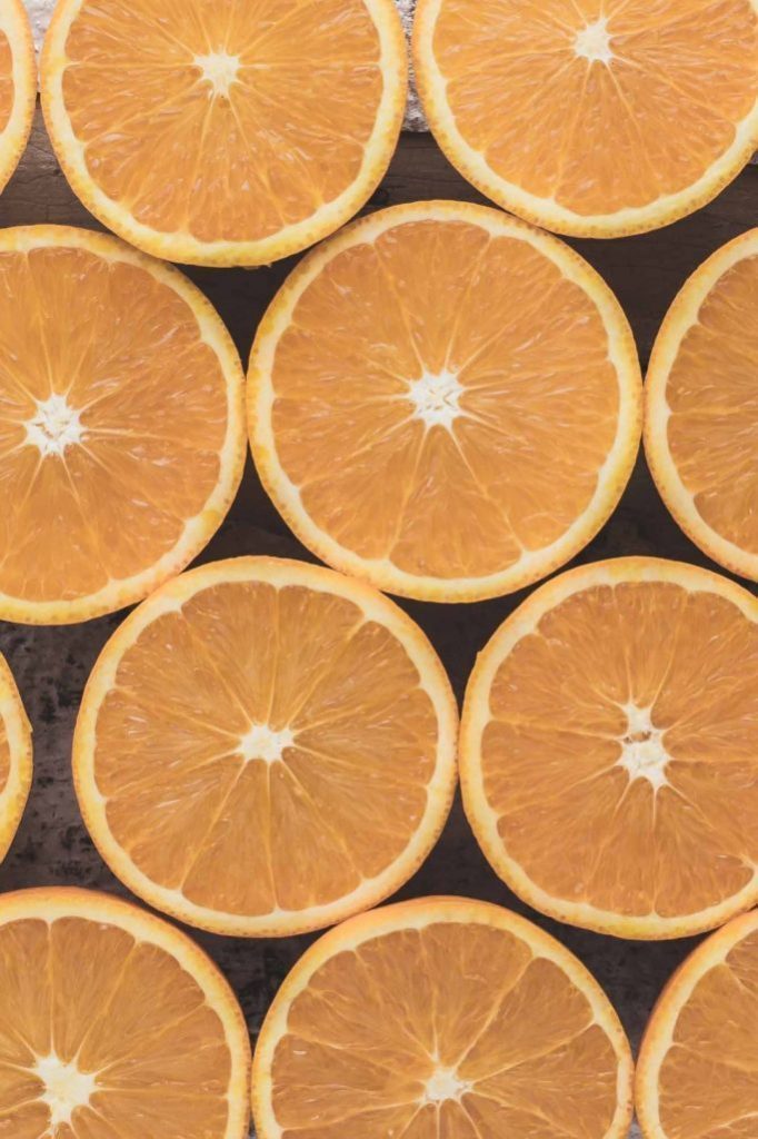 Oranges cut in half in a pattern