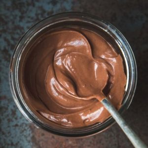 Overhead of a jar of swirled chocolate mousse