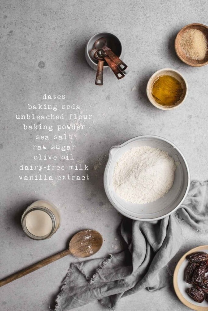 An overhead image of the sticky date cake ingredients with a list of the ingredients written in white