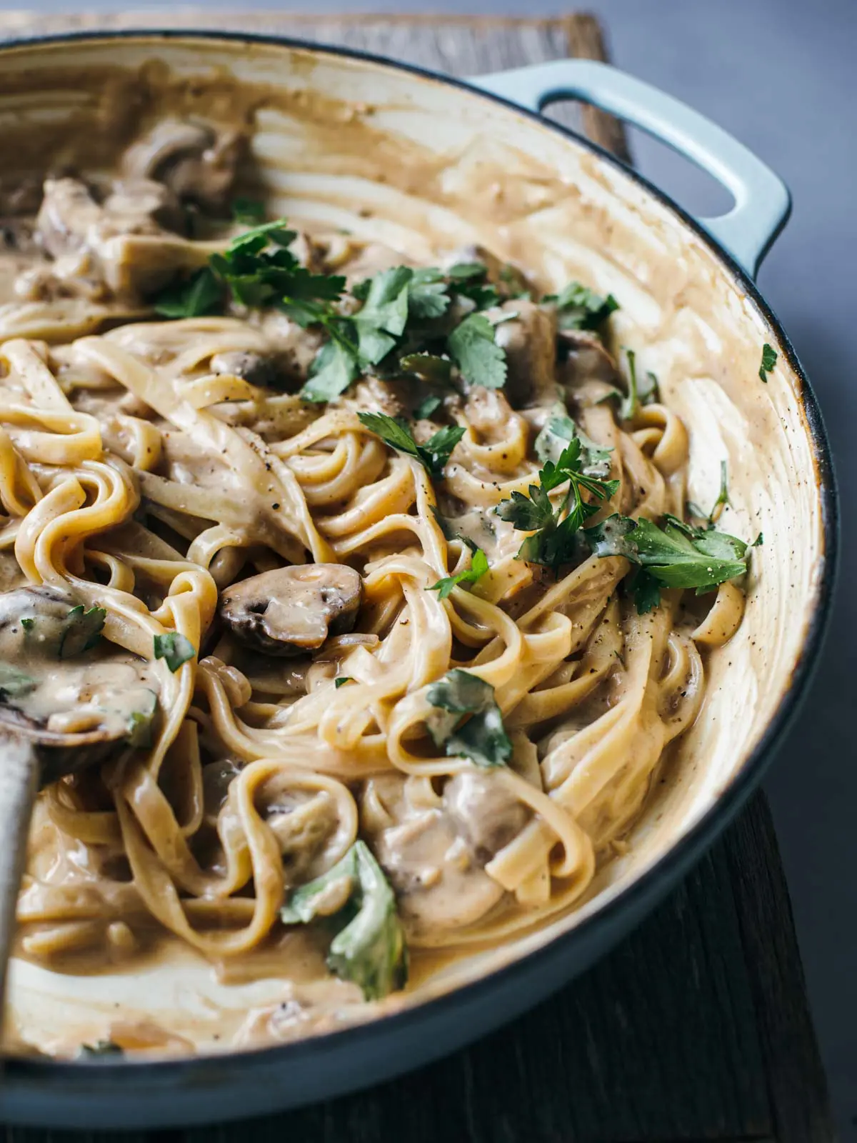 Pasta and mushroom sauce in a pot.