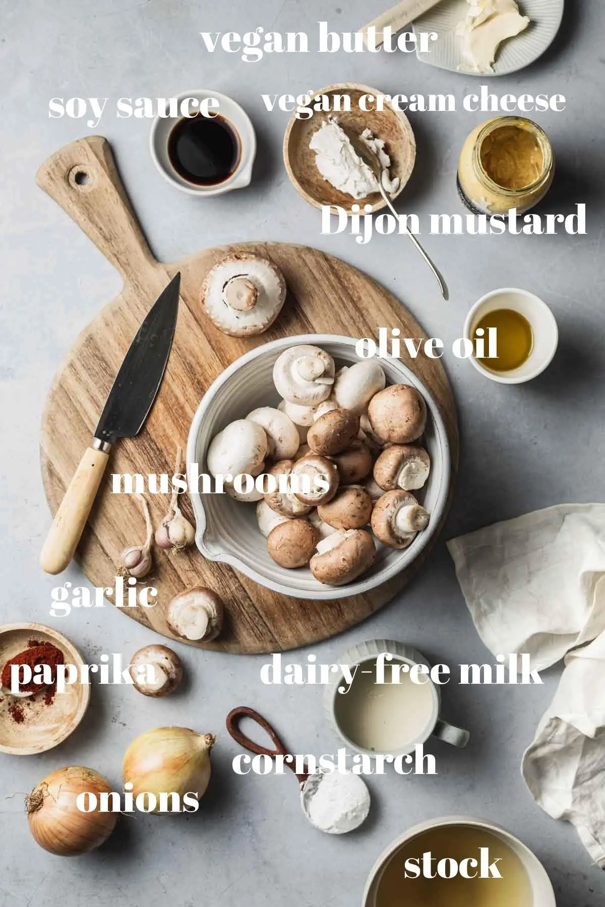 Mushroom stroganoff ingredients in bowls.