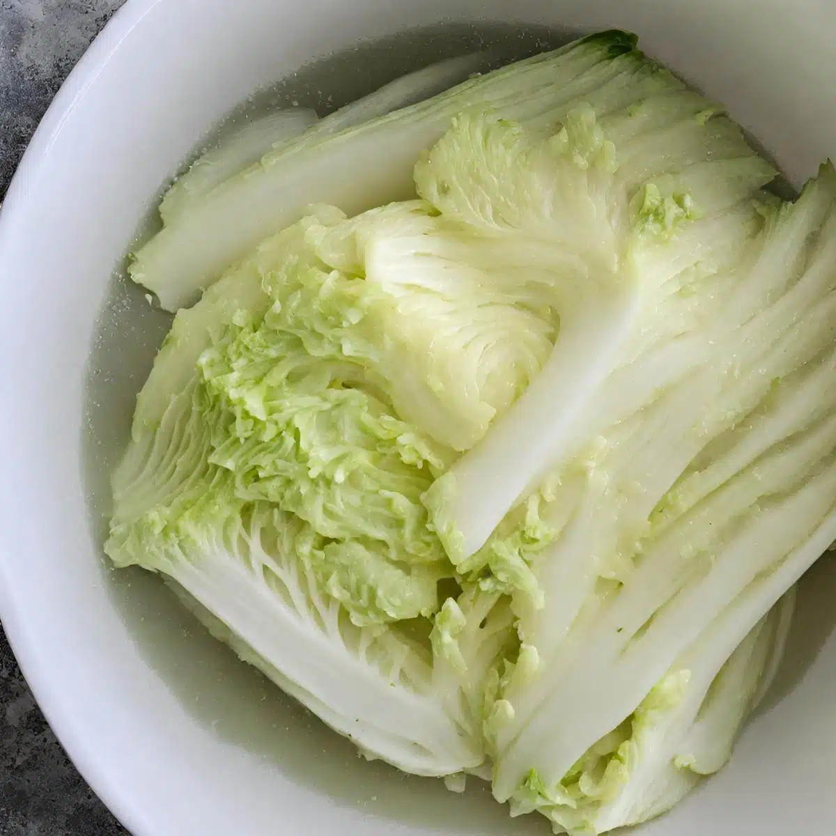 A bowl of cabbage in water.