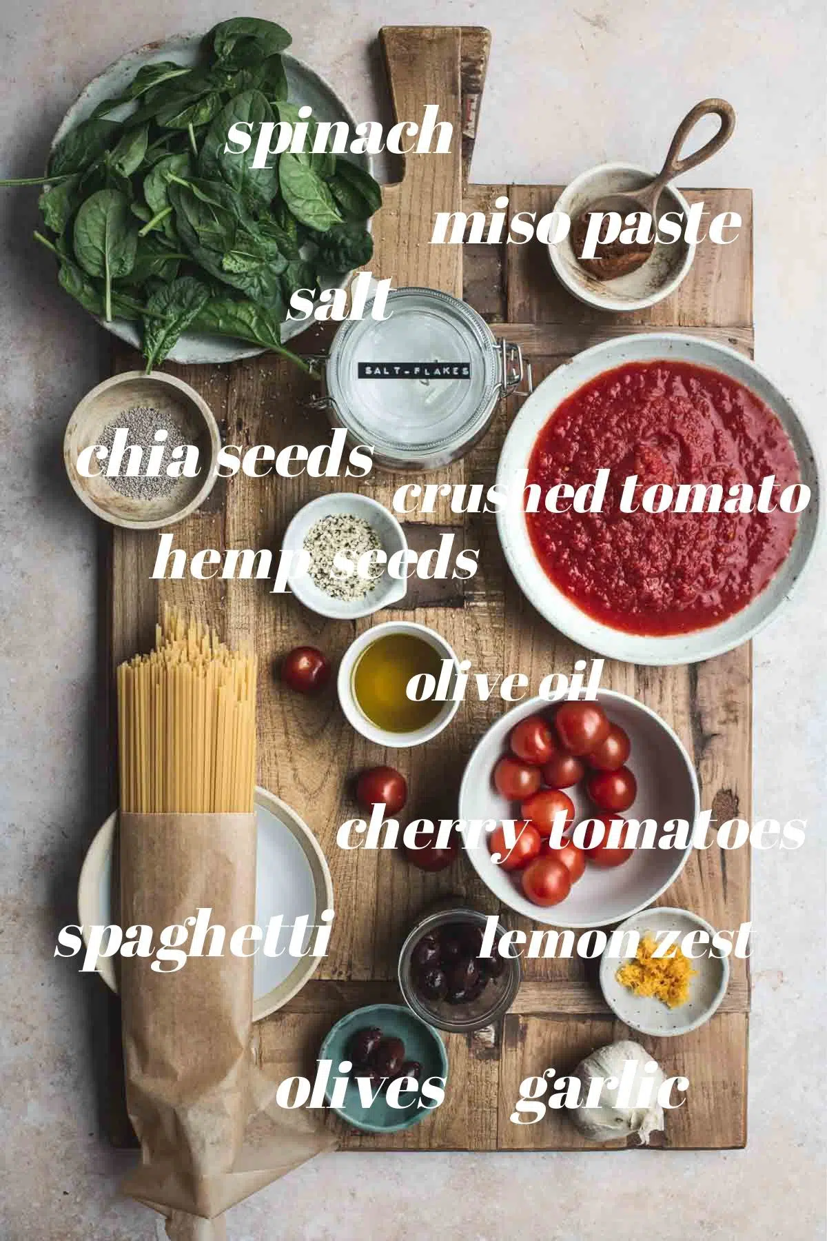Tomato spaghetti ingredients on a board. 