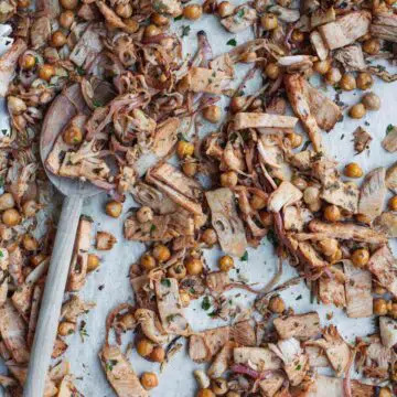 Roasted chickpeas and jackfruit on a tray.