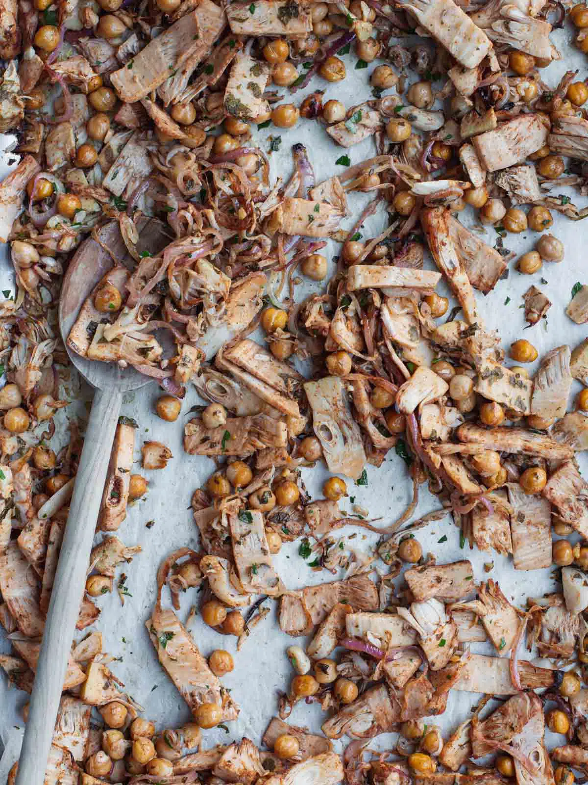 Roasted chickpeas and jackfruit on a tray.