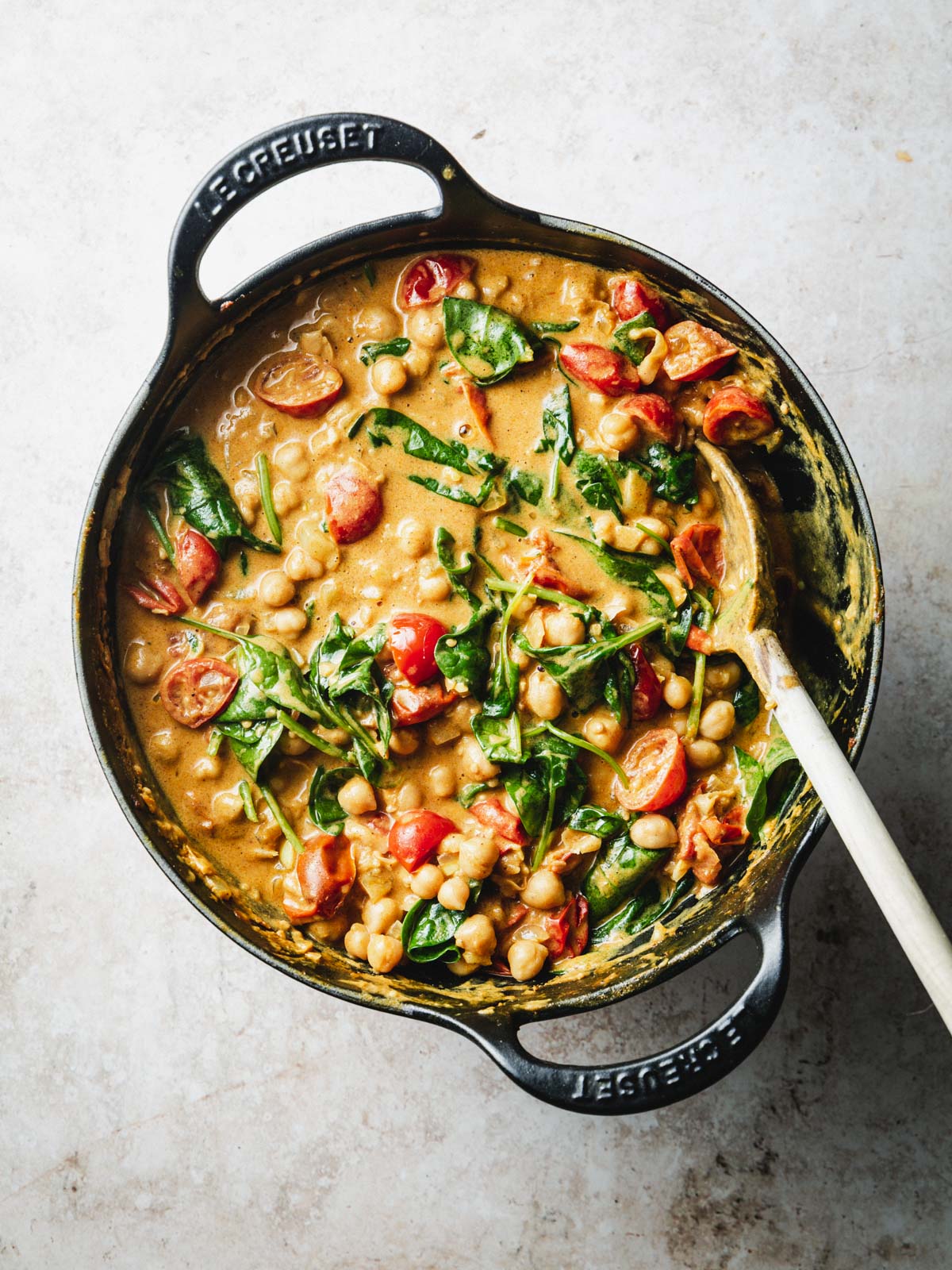 A large pan of chickpea curry.