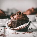 A chocolate cupcake with chocolate buttercream.