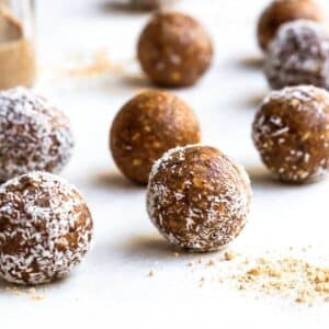 Snack balls on a white surface.