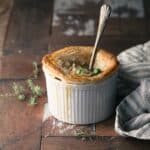 A single pot pie on a table.