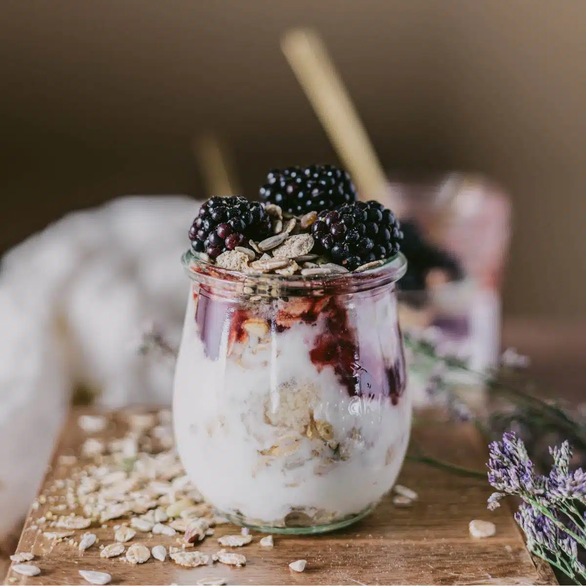 Overnight oats in a jar on a table.