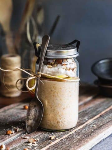 A jar of oats with a spoon.