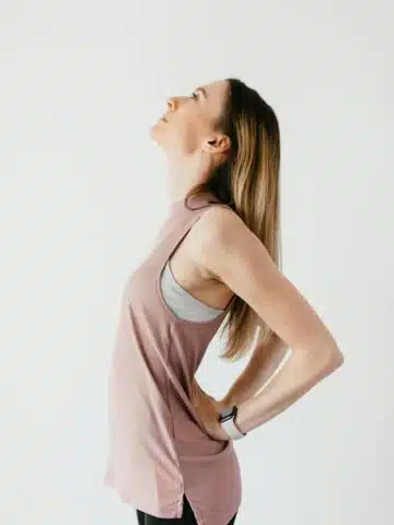 A fit woman standing.