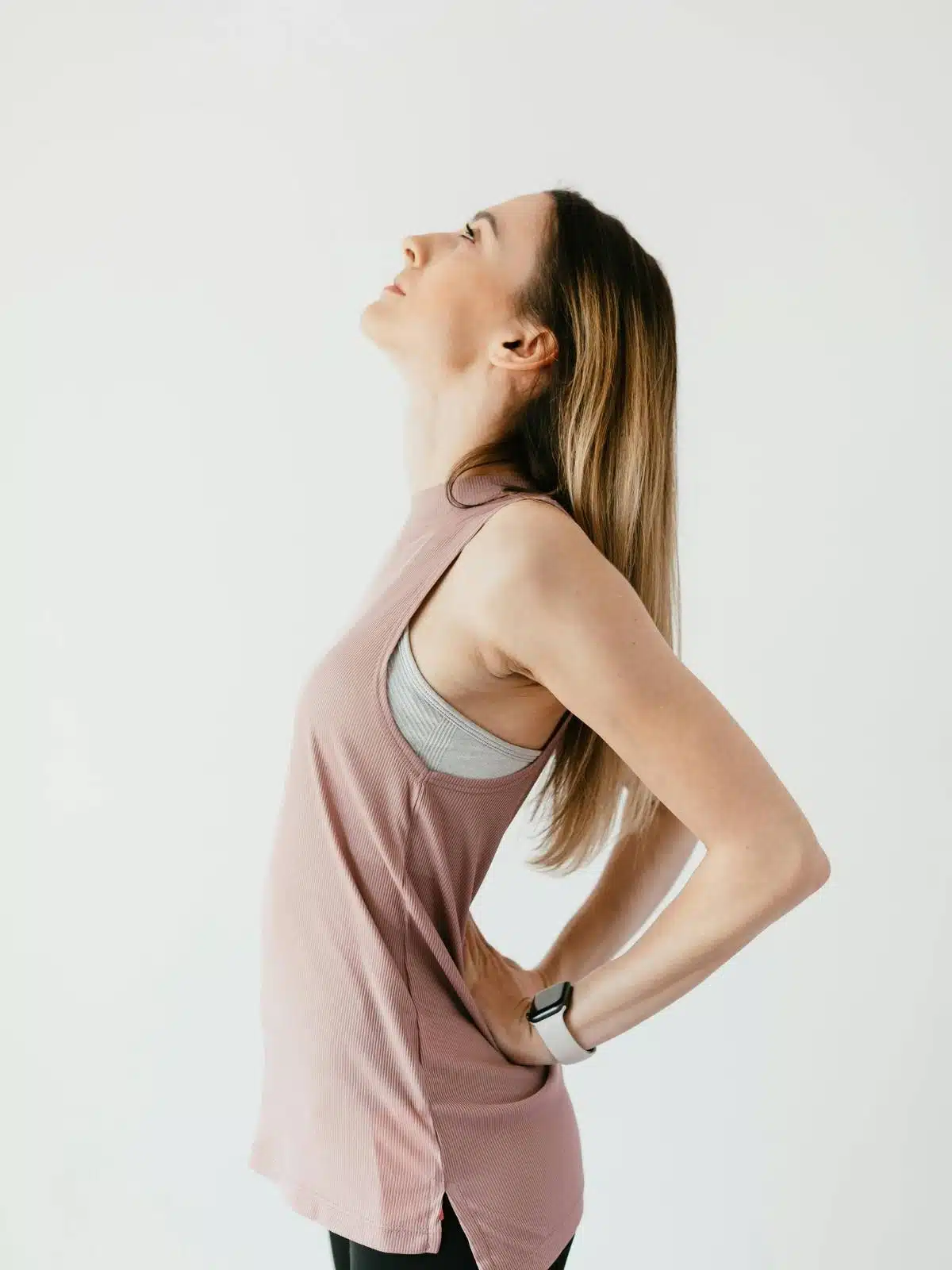 A fit woman standing. 