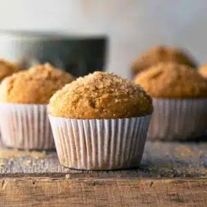 Whole wheat pumpkin muffins on a tray.