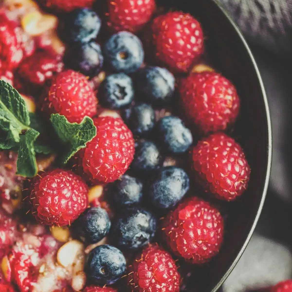 Overnight oats and berries in a jar for fibre article.